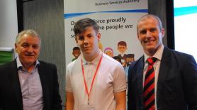 Alistair McDonald, chief executive of the NHSBSA, Kieren Forrest. Kieren, 16, who attends Studio West school in Newcastle, and Ben Mason, founder of globalbridge.